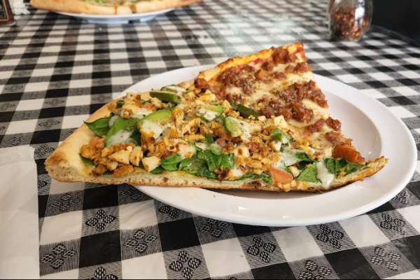 Specialty pizza slices from Delizia's Pizza
